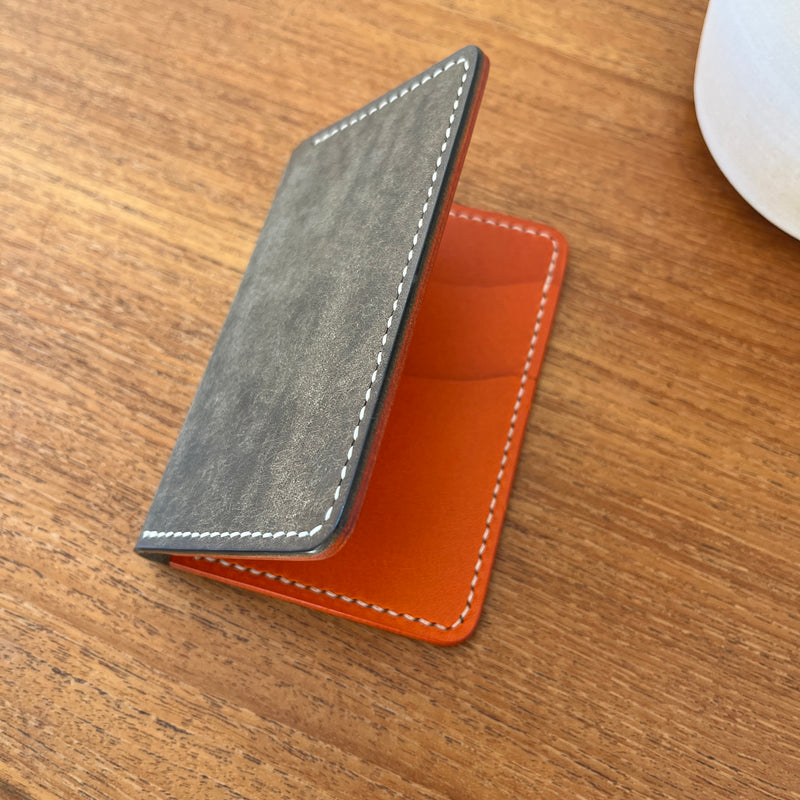 BI-FOLD - GREY PUEBLO + ORANGE